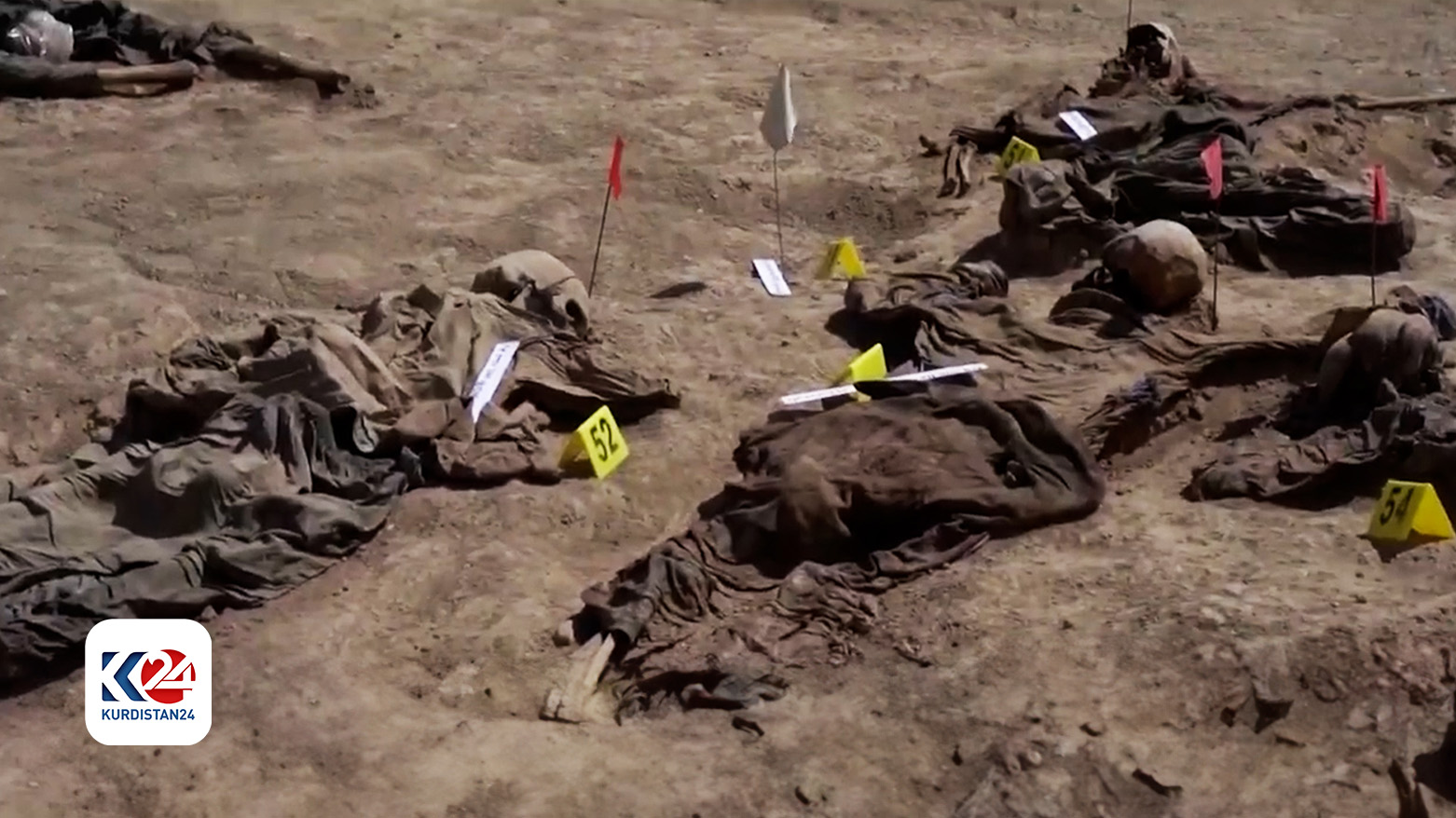 A number of exhumed bodies from the Alo Antar Pit in Tal Afar. (Photo: Kurdistan 24)